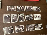 Front side of 14 black and white Beatles collectible cards featuring various scenes with the band from the movie "A Hard Day's Night".