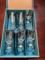 Set of six Eamon of Ireland etched Irish coffee glasses in original box with teal satin lining.