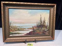Frontal view of the vintage oil painting showing the full landscape and frame.