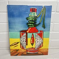Front view of the decorative ceramic tile showing colorful plate with Tabasco sauce bottle artwork.