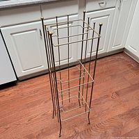 Three-quarter side view showing full height, frame and shelf details.