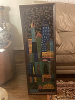 Full front view of framed mosaic art piece