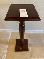 Top view of the rectangular top and fluted leg plant stand