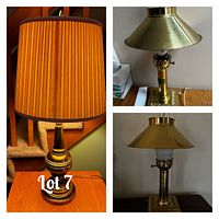 Lot of three lamps: one table lamp with striped base and vertical pleated tan shade, two brass lamps with wide shallow metal shades on square bases.