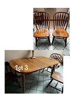 Photo of wooden rectangular kitchen table with a chair beside it, wood grain and shape visible.