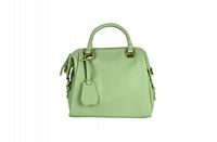 Front view of the compact mint green satchel with double handles and gold hardware.