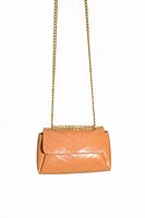 Front view of the beige vegan PU Jeanne Lottie crossbody bag featuring gold chain strap and chevron quilted pattern.