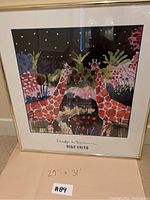 Full view of framed print propped against wall with handwritten dimensions below