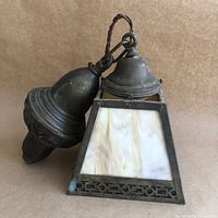 Picture of the pendant light fixture showing top hanging canopy, frame, and glass panels.