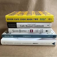 Stacked view of all five cookbooks showing titles and condition