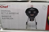 Box front showing Master Chef branding and image of charcoal kettle barbecue.