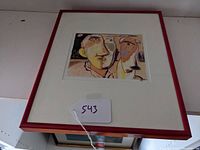 Framed modernist print showing the full artwork with a red frame and white matting, featuring a man and dog in abstract style.