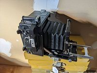 Side view of camera body extended with bellows