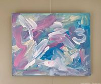 Front view of abstract acrylic painting showing predominant blue, pink, white, and purple brush strokes.