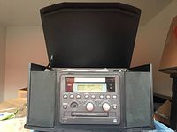 Sony vinyl to CD recorder front view with speakers and controls visible