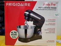 Photo of the front of the Frigidaire Ready Prep Food Stand Mixer box showing product image and main features.