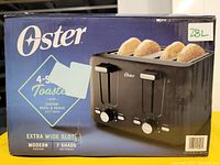 Boxed Oster 4-slice toaster showing brand name, product features including extra wide slots, custom bagel & reheat settings, modern design, and 7 shade settings.