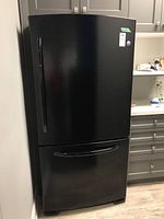 Front exterior view of refrigerator showing full unit profile