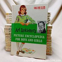 Front cover of Art Linkletter's Picture Encyclopedia volume 12 showing illustrated girl, book title, and portrait of Art Linkletter.