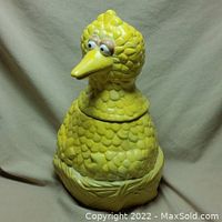 Big Bird ceramic cookie jar with textured feathers and detailed face.