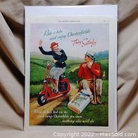 Full view of the vintage 1937 Chesterfield cigarette ad showing two people in a countryside setting with promotional text.