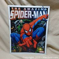 Front of colorful Marvel Spider-Man tin sign with multiple villains
