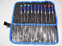 Set of 10 mini screwdrivers rolled out and secured in a black roll up pouch with blue trim, showing the handles and shafts clearly.