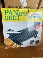 Box of Aurora Panini Grill showing front image and branding.