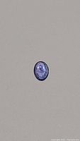Close-up of oval cut tanzanite showing color and clarity