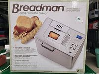 Boxed Breadman Professional Bread Maker with product image, features, and branding visible on packaging.