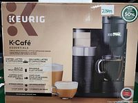 Photo of the Keurig K-Cafe Essentials box showing the product image and features listed on front.