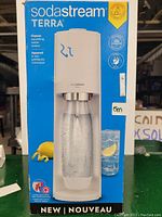 Photo of the SodaStream Terra sparkling water maker box showing the product and packaging with key features.