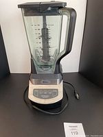 Front view of Ninja blender showing full pitcher and control panel.
