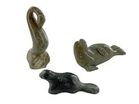 Photo showing all three soapstone carvings: swan, seal, and beaver.