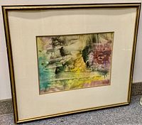 Photo of framed abstract expressionist watercolour painting by Miriam Simpson, showing full frame and artwork.