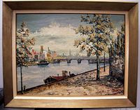 Full frontal photo of the oil painting in wood frame showing canal scene with boats, stone bridge, trees, and buildings under a cloudy sky.