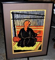 Front view of the signed chromolithograph in frame showing the artwork and matting.