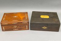 Two wooden storage boxes side by side, showing overall size, finish, and inlay details.