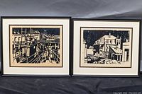 Both framed monochrome prints displayed side by side showing overall size and condition.