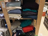 Bottom photo displays assorted sweaters in various colors including green, red, and gray piled loosely showing thickness and different knits.