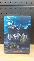 Front cover of the DVD box set showing Hogwarts castle and series title.