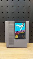 Front view of the NES Kung Fu game cartridge showing the main label graphic and branding.