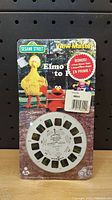 Sesame Street View-Master sealed pack featuring Big Bird and Elmo with bonus reels noted on front.