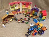 Wide shot showing entire lot with house, nativity stable, school kids, and vehicles