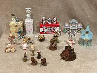 Full view of the assortment showing multiple figurines and buildings, arranged for display.