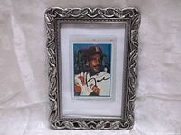 Framed Jim Rice signed baseball card with decorative silver frame against white background