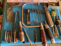 Overview of all vintage and older hand tools including screwdrivers, chisels, saw, files, and other metal hand tools.