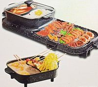Electric hot pot and grill cooking appliance shown with food prepared on grill and in hot pot compartments demonstrating usage.