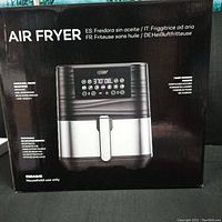 Box of Innsky air fryer showing image of the product with some specifications in multiple languages and the digital display control panel.