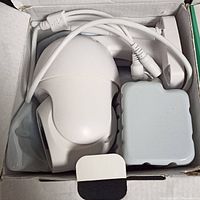 Solar powered mobile network camera with attached cables fitted in box